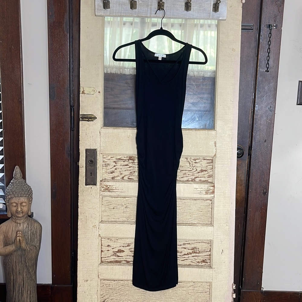 Little Black Dress from Nine Britton.  Gathered at the seams. Snug fit. Size S